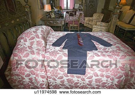 Interior of guest bedroom with displayed antique clothing of the day at Hearst Castle, "America's Castle, " San Simeon, Central California Coast View Large Photo Image Stock Photo - Interior of guest bedroom with displayed antique clothing of the day at Hearst Castle, "America's Castle, " San Simeon, Central California Coast. Fotosearch