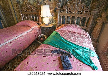 Interior of guest bedroom with displayed antique clothing of the day at Hearst Castle, "America's Castle, " San Simeon, Central California Coast View Large Photo Image Stock Photography - Interior of guest bedroom with displayed antique clothing of the day at Hearst Castle, "America's Castle, " San Simeon, Central California Coast. Fotosearch