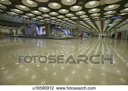 Interior view of Madrid Barajas Airport (MAD), Spain's busiest airport View Large Photo Image Stock Image - Interior view of Madrid Barajas Airport (MAD), Spain's busiest airport. Fotosearch