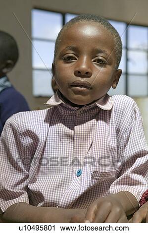Karimba School with close up of young student in new classroom in North Kenya, Africa View Large Photo Image Stock Image - Karimba School with close up of young student in new classroom in North Kenya, Africa. Fotosearch