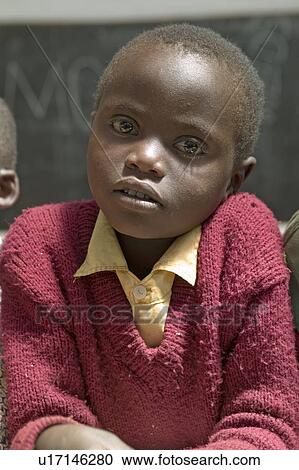 Karimba School with close up of young student in new classroom in North Kenya, Africa View Large Photo Image Stock Image - Karimba School with close up of young student in new classroom in North Kenya, Africa. Fotosearch