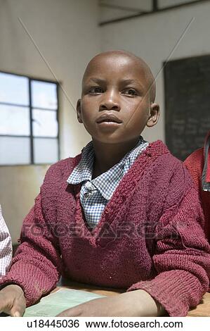 Karimba School with close up of young student in new classroom in North Kenya, Africa View Large Photo Image Stock Photograph - Karimba School with close up of young student in new classroom in North Kenya, Africa. Fotosearch
