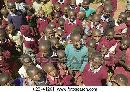 Stock Image - Karimba School with smiling school children in North Kenya, Africa. Fotosearch