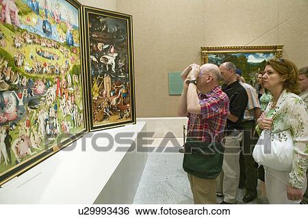 Man photographs "The Garden of Earthly Delights" by Hieronymus Bosch, in the Museum de Prado, Prado Museum, Madrid, Spain View Large Photo Image Stock Photograph - Man photographs "The Garden of Earthly Delights" by Hieronymus Bosch, in the Museum de Prado, Prado Museum, Madrid, Spain. Fotosearch