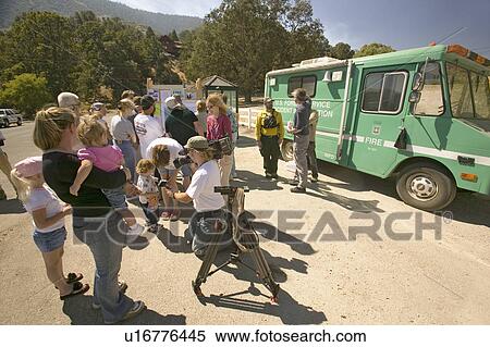 Media crews and forest service personnel meet with locals during Ventura County's Day Fire of 2006 View Large Photo Image Stock Photography - Media crews and forest service personnel meet with locals during Ventura County's Day Fire of 2006. Fotosearch