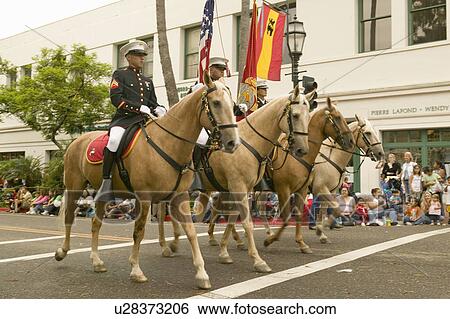 Military personnel on horseback participate at the opening day parade down State Street of Old Spanish Days Fiesta held every August in Santa Barbara, California View Large Photo Image Stock Photograph - Military personnel on horseback participate at the opening day parade down State Street of Old Spanish Days Fiesta held every August in Santa Barbara, California. Fotosearch