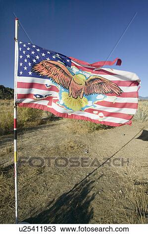 Native American Indian flag blows in wind on Chumash Indian land on highway 33, near Cuyama California View Large Photo Image Stock Image - Native American Indian flag blows in wind on Chumash Indian land on highway 33, near Cuyama California. Fotosearch