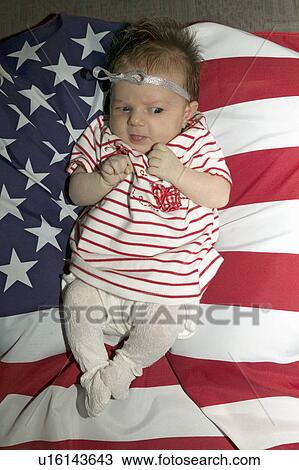Newborn baby (Sophia Larson) wrapped in American flag was born on October 16th, the birthday of the 300 Millionth American, Ventura, California View Large Photo Image Stock Image - Newborn baby (Sophia Larson) wrapped in American flag was born on October 16th, the birthday of the 300 Millionth American, Ventura, California. Fotosearch