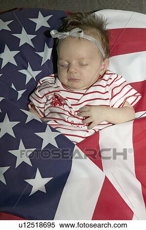Newborn baby (Sophia Larson) wrapped in American flag was born on October 16th, the birthday of the 300 Millionth American, Ventura, California View Large Photo Image Stock Photography - Newborn baby (Sophia Larson) wrapped in American flag was born on October 16th, the birthday of the 300 Millionth American, Ventura, California. Fotosearch