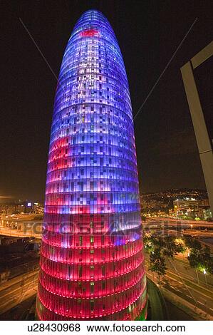 Stock Photo - Night view of phallic-shaped Torre Agbar or Abbar Tower in Barcelona, Spain, designed by Jean Novel, September 2006. Fotosearch