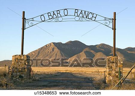 O'Bar'o Ranch gate and mountains at sunset in central New Mexico, Route 48 near Smokey Bear Historical Park View Large Photo Image Stock Image - O'Bar'o Ranch gate and mountains at sunset in central New Mexico, Route 48 near Smokey Bear Historical Park. Fotosearch