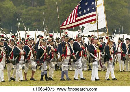 Patriot soldiers march to Surrender Field as part of the 225th Anniversary of the Victory at Yorktown, a reenactment of the siege of Yorktown, where General George Washington commanded 17, 600 American troops and French Comte de Rochambeau lead 5500 French View Large Photo Image Stock Photography - Patriot soldiers march to Surrender Field as part of the 225th Anniversary of the Victory at Yorktown, a reenactment of the siege of Yorktown, where General George Washington commanded 17, 600 American troops and French Comte de Rochambeau lead 5500 French. Fotosearch