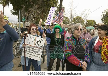 Stock Photo - Protesters start marching against Iraq War and George W. Bush at an anti-Iraq War protest march in Santa Barbara, California on March 17, 2007. Fotosearch