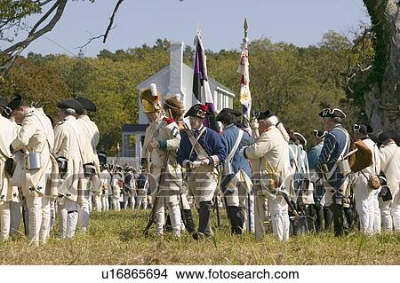 Re-enactment of Attack on Redoubts 9 & 10 where the major infantry action of the siege of Yorktown took place. General Washington's armies captured two British fortifications, Endview Plantation (circa 1769), near Yorktown Virginia. Part of the 225th an View Large Photo Image Picture - Re-enactment of Attack on Redoubts 9 & 10 where the major infantry action of the siege of Yorktown took place. General Washington's armies captured two British fortifications, Endview Plantation (circa 1769), near Yorktown Virginia. Part of the 225th an. Fotosearch