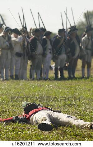 Stock Image - Re-enactment of Attack on Redoubts 9 & 10 where the major infantry action of the siege of Yorktown took place. General Washington's armies captured two British fortifications, Endview Plantation (circa 1769), near Yorktown Virginia. Part of the 225th an. Fotosearch