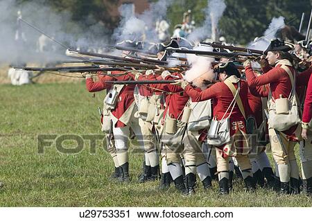 Stock Image - Re-enactment of Attack on Redoubts 9 & 10 where the major infantry action of the siege of Yorktown took place. General Washington's armies captured two British fortifications, Endview Plantation (circa 1769), near Yorktown Virginia. Part of the 225th an. Fotosearch