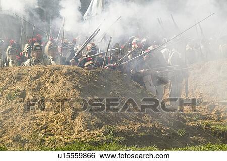 Stock Photograph - Re-enactment of Attack on Redoubts 9 & 10 where the major infantry action of the siege of Yorktown took place. General Washington's armies captured two British fortifications, Endview Plantation (circa 1769), near Yorktown Virginia. Part of the 225th an. Fotosearch