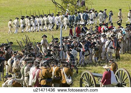Stock Photograph - Re-enactment of Attack on Redoubts 9 & 10 where the major infantry action of the siege of Yorktown took place. General Washington's armies captured two British fortifications, Endview Plantation (circa 1769), near Yorktown Virginia. Part of the 225th an. Fotosearch