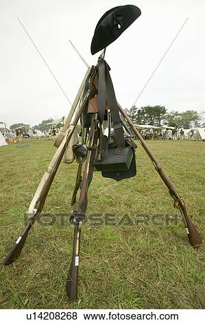 Stock Photo - Re-enactment of Revolutionary War Encampment demonstrates camp life of Continental Army as part of the 225th Anniversary of the Siege of Yorktown, Virginia, 1781, ending the American Revolution with the defeat of the British Army and Lord Cornwallis surre. Fotosearch