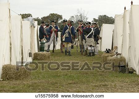 Re-enactment of Revolutionary War Encampment demonstrates camp life of Continental Army as part of the 225th Anniversary of the Siege of Yorktown, Virginia, 1781, ending the American Revolution with the defeat of the British Army and Lord Cornwallis surre View Large Photo Image Stock Photo - Re-enactment of Revolutionary War Encampment demonstrates camp life of Continental Army as part of the 225th Anniversary of the Siege of Yorktown, Virginia, 1781, ending the American Revolution with the defeat of the British Army and Lord Cornwallis surre. Fotosearch