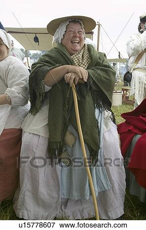 Stock Photo - Re-enactment of Revolutionary War Encampment demonstrates camp life of Continental Army as part of the 225th Anniversary of the Siege of Yorktown, Virginia, 1781, ending the American Revolution with the defeat of the British Army and Lord Cornwallis surre. Fotosearch