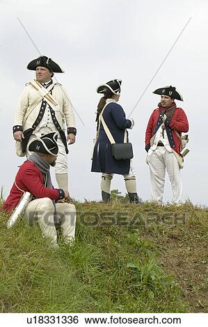 Stock Photograph - Re-enactment of Revolutionary War Encampment demonstrates camp life of Continental Army as part of the 225th Anniversary of the Siege of Yorktown, Virginia, 1781, ending the American Revolution with the defeat of the British Army and Lord Cornwallis surre. Fotosearch