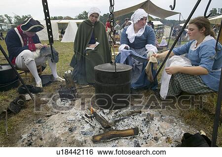 Stock Photograph - Re-enactment of Revolutionary War Encampment demonstrates camp life of Continental Army as part of the 225th Anniversary of the Siege of Yorktown, Virginia, 1781, ending the American Revolution with the defeat of the British Army and Lord Cornwallis surre. Fotosearch