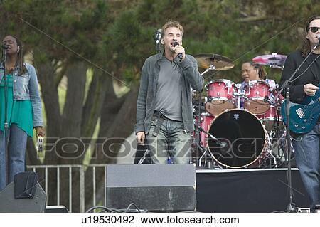 Stock Image - Rock star Kenny Loggins performs in outdoor concert in Ventura, California for the Ventura Hillsides Conservancy and the Ventura Hillsides Music Festival. Fotosearch