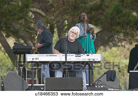 Stock Image - Rock star Michael McDonald performs in outdoor concert in Ventura, California for the Ventura Hillsides Conservancy and the Ventura Hillsides Music Festival. Fotosearch
