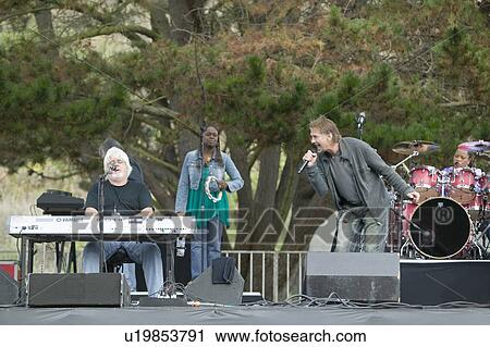 Stock Image - Rock star Michael McDonald performs in outdoor concert in Ventura, California for the Ventura Hillsides Conservancy and the Ventura Hillsides Music Festival. Fotosearch