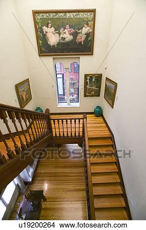 Picture - Stairway to paintings by Joaquín Sorolla y Bastida (1863-1923) as seen in The Sorolla Museum, Madrid, Spain. Fotosearch