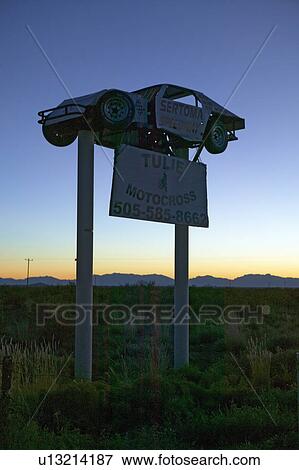 Stock car raised as promotional item off State Highway 54 in Southern New Mexico View Large Photo Image Stock Photo - Stock car raised as promotional item off State Highway 54 in Southern New Mexico. Fotosearch