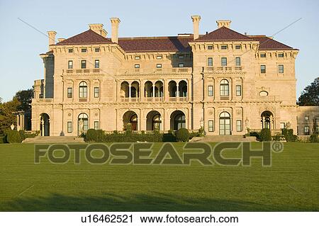 Stock Image - The Breakers, built by Cornelius Vanderbilt of the Gilded Age, as seen on the Cliff Walk, Cliffside Mansions of Newport Rhode Island. Fotosearch