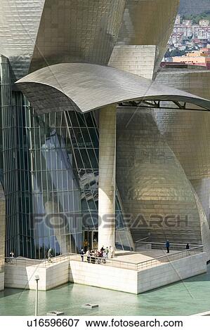 The Guggenheim Museum of Contemporary Art of Bilbao (Bilbo), located on the North Coast of Spain in the Basque region. Nicknamed "The Hole", this is a contemporary museum built of titanium, limestone and glass and was designed by Canadian citizen, Frank O View Large Photo Image Stock Photo - The Guggenheim Museum of Contemporary Art of Bilbao (Bilbo), located on the North Coast of Spain in the Basque region. Nicknamed "The Hole", this is a contemporary museum built of titanium, limestone and glass and was designed by Canadian citizen, Frank O. Fotosearch