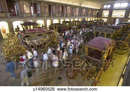 Tour group reviews antique Royal coaches in Museum of Coaches in Lisbon/Lisboa Portugal View Large Photo Image Stock Photo - Tour group reviews antique Royal coaches in Museum of Coaches in Lisbon/Lisboa Portugal. Fotosearch
