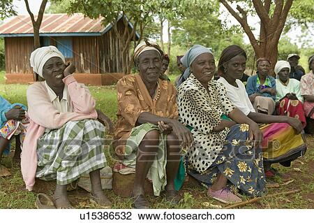 Stock Image - Women without Husbands" women who have been ostracized from society or who have lost their husbands and only have themselves as a group to look after each other in Meru, Kenya, Africa. Fotosearch