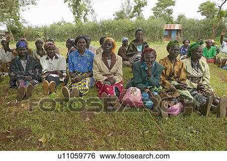 Stock Photograph - Women without Husbands" women who have been ostracized from society or who have lost their husbands and only have themselves as a group to look after each other in Meru, Kenya, Africa. Fotosearch