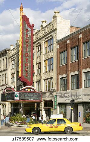 Yellow taxi drives by Providence Performing Arts Center marquee sign, Providence, Rhode Island View Large Photo Image Stock Photo - Yellow taxi drives by Providence Performing Arts Center marquee sign, Providence, Rhode Island. Fotosearch