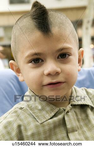 Young boy with Mohawk haircut looks in camera in Santa Barbara, CA View Large Photo Image Picture - Young boy with Mohawk haircut looks in camera in Santa Barbara, CA. Fotosearch