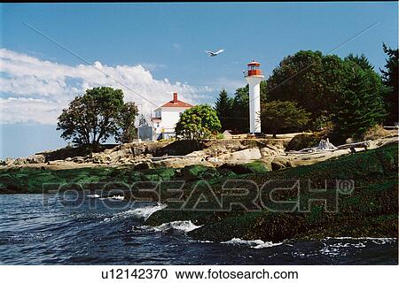 Stock Image - lighthouse located at Active Pass, British Columbia, Canada. Fotosearch