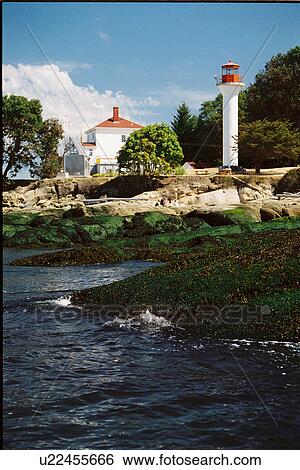 Stock Photograph - lighthouse located at Active Pass, British Columbia, Canada. Fotosearch