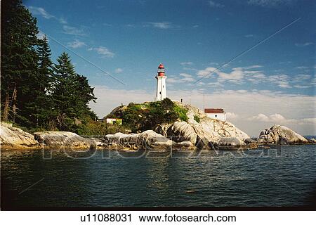 Stock Image - lighthouse located at Atkinson Point, British Columbia, Canada. Fotosearch