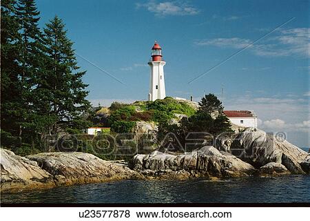 Stock Photo - lighthouse located at Atkinson Point, British Columbia, Canada. Fotosearch