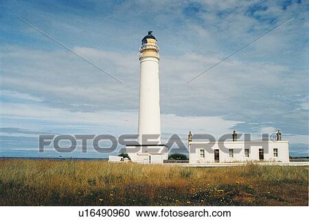 Stock Image - lighthouse located at BarnesNess, Scotland. Fotosearch