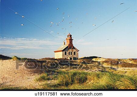 Stock Image - lighthouse located at Block IslandNorth, Rhode Island, United States. Fotosearch