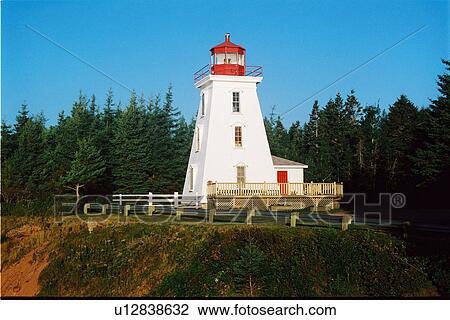 Stock Image - lighthouse located at Cape Bear, PEI. Fotosearch