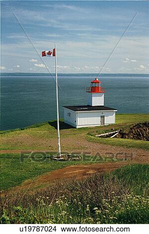 Picture - lighthouse located at Cape Dor, Nova Scotia. Fotosearch