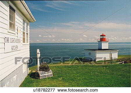 Stock Photo - lighthouse located at Cape Dor, Nova Scotia. Fotosearch