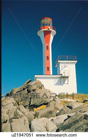 Stock Image - lighthouse located at Cape Forchu, Nova Scotia. Fotosearch