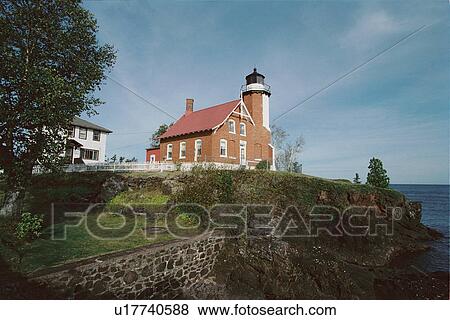 lighthouse located at EagleHabor, Michigan, United States View Large Photo Image Stock Photo - lighthouse located at EagleHabor, Michigan, United States. Fotosearch